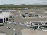 An overview of the airport. Many of the vehicles you see are moving
